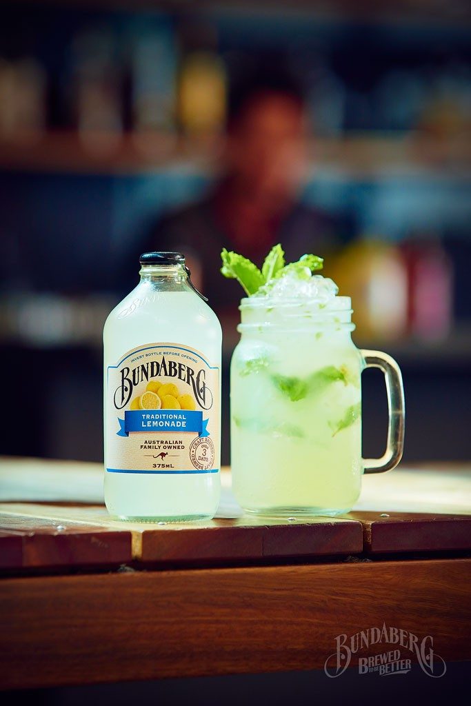 Nanna's Lemonade Mocktail with Bundaberg Traditional Lemonade garnished with mint sprig