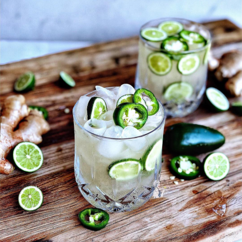 Jalapeno Ginger Mule Cocktail garnished with extra jalapeno and lime