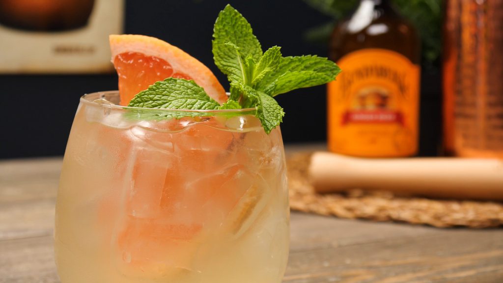 Gin Gin Mule garnished with a sprig of mint